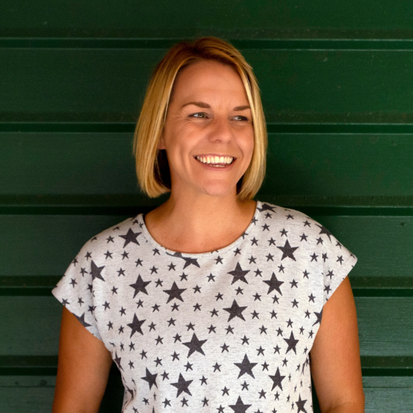 Head shot photo of author Nat Amoore