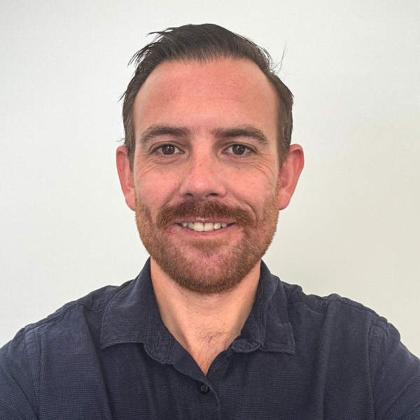 Head shot photo of author Taylor Hampton